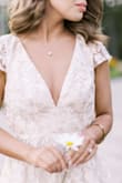 Absolutely beautiful! Really wonderful quality. I was surprised, TBH. Purchased to wear to my bridal shower but loved it so much I chose to wear it for our engagement shots. - Kathleen S.
