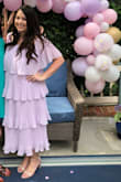 I wore this for my bridal shower and got so many compliments!! I love it so much that I want more colors! I ordered an XL because I wasn't sure if the L would fit (also the XL was all that was available in this color at the time), but I could possibly wear a L because of the elastic waist and chest. I am very busty, but I felt supported and concealed in the dress! All in all, a great special occasion dress! - Jessica S.