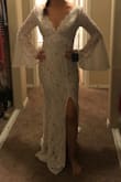 I'm having a small ceremony and this dress is prefect. I wanted something bohemian without the price tag. I'm usually a size 6 in Lulus so I had ordered a M. It was too big so I got a small and it fits like a glove. The lace is so beautiful and it hugs all the curves in just the right places. This dress looks like it costs way more than what I paid. Once again Lulus comes through. - Betsy C.