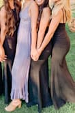 One of my best friends chose this dress for her bridesmaids dresses! So pretty and classic, but a bit of a pain. This dress is beautiful in theory, but fairly difficult to wear. I ordered "boob tape" online, for a few of us bridesmaids with 34C breasts, to wear with this dress because the low back makes it impossible to wear a real bra. Our tape didn't work very well, and some of the other bridesmaids had trouble with their stick-on bras too. Additionally, because it's tight-fitting, many of us wore spanx, but at least one bridesmaid had to fashion tape her spanx to her stomach to keep from showing a line. If we didn't wear spanx, the bride requested we wear no-show underwear or go commando, as to avoid panty lines. It was a little on the pricey side for many of us, but the bride tried her best to ensure we all had discount codes of some sort, and she had her heart set on long, black dresses for her wedding. And, even though I am semi-tall, I still had to get it hemmed, which cost $40 since it has two layers. With that said, the dress did look SO BEAUTIFUL with the greens and whites of the florals and natural scenery of her outdoor wedding. And, since we were all holding bouquets, that covered up our midsections since we were worried about our tummy areas in the tight dress. I may wear it again for another formal function in the future since it's classic in color and design, but I'll just be better about how to hold up my boobs lol. - Liz R.
