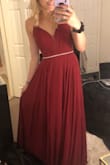 I get so nervous buying dresses online due to sizing, but this has a lace up back so it's adjustable a few sizes down if needed! It is very true to size and the color is stunning! It is long so I'll Need to wear heels, but I was planning on it because I'm wearing it to a military ball. After trying it on I didn't want to take it off! - Halley N.
