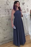 This dress impressed at a few weddings! The color was perfect, neutral but still saturated. The fabric feels expensive and dry cleans beautifully. The back was a bit tricky at first but if you hang it right you can just slide on into it! Recommend highly! - Cat F.
