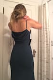 Ordered the size 2 for a wedding I was attending as a guest. I'm usually a S in Lulu's and this fit PERFECTLY. The simple design really does let the neck and back cowls stand out, and it makes for such a classy look. Lotta compliments on the cut and color. Definitely worth the order!
I'm 5'7 and around 128-130 pounds. Size 2-4 in shorts/pants, and it fit my hips perfectly. 
It's definitely made for a smaller chest. I'm a 32 B, and boobs any larger than that wouldn't be comfy in the size 2. I'd suggest sizing up if you have a larger chest. 
It zips on the side from around waist-height up to the armpit, and the clasp below the armpit fit me well. Comfy, too, I was able to dance after eating a giant dinner (classic). 

Screenshotted two photos out of a video I took while trying it on. I was moving around in both of those photos, and the dress still falls so well. - Hannah M.