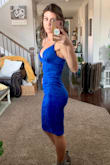 Okay!!! This dress is sexy and super comfortable! The material feels like suede but stretchy and amazing! It hugs every curve and adds some!!! It is very reveling in the breast area, just beware. I thought my husbands' jaw was going to hit the floor when he saw it because I usually don't flaunt the girls in the open. ;) the color is incredible and rich, just like it appears. Worth the buy! - Stephanie K.