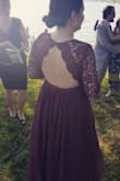 I just loved this unique dress with its burgundy lace and show-stopper back! It was gaping a bit so I had it professionally tacked in the back--had to have it hemmed too (always do, I'm on the shorter side of average!). Lots of compliments. Totally worth it. - Lisa K.