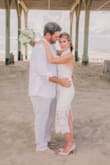 This dress was gorgeous! So chic and classy! I got tons of compliments on my wedding day. - Christy L.
