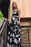 So pretty & flowy! I had so many compliments. Wore this for my rehearsal dinner & absolutely felt beautiful in this! The waist on the skirt could be a bit smaller but nothing too dramatic. Length is long but with 4 inch heels I wasn't stepping on it too much. - Mariah M.