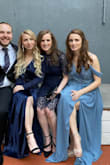 I wore this dress to my sister's wedding and loved it! The slate blue color and the detail at the top are both beautiful. The top area also fits really nicely and the adjustable straps were perfect. I don't have the wedding pics yet but shared what I could for reference!

The only two things to note: 
- It is extremely long. I am pretty short so I knew I'd have to get it hemmed either way but this dress was very long. I'm 5'1" and probably got over 6" taken off and thats with wearing 5" heels. So the dress was probably about a foot too long for me.
-The material pulls easily. The bottom material of the dress pulls and rips very easily so handle with care. I accidentally ripped my dress at one of the seams but the tailor fixed it easily thankfully. - Erica C.