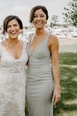 The dress fit PERFECTLY! I wore it with 2 inch heels and it hovered just right above the floor. I didn't wear a bra with it and was concerned about it at first but had no issues and never had any "slip" ups. I was comfortable dancing, and partying the night away and got compliments all evening. - Kelly T.