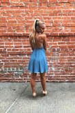 I wore it to a wedding and it was absolutely perfect. I used stick on bra underneath and adjusted the back strings a little (small bust) and it fit amazing! I felt like a princess in a fairytale. I loved it because even though it fits so well it doesn't get uncomfortably tight when you eat too much and it doesn't show the belly at all. Of course the color and design is cute and most importantly it's not too short, I wasn't worried about my underwear being exposed. Look no further! - Daria K.