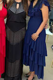 I wore this dress to a wedding and it was perfect. The details on this dress is lovely. The ruffles enhanced by the high/low length made the overall look of this dress stunning. It was also very comfortable and easy to wear all evening. - Somy S.