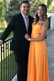 This dress was my favorite online purchase ever! I've never worn orange before, and the color was perfect, exactly like what is shows online. I wore this dress to a wedding and received SO many compliments (including from the bride). The dress is extremely comfy and the way it moves when you walk is stunning. Be prepared for a lot of compliments if you purchase this dress! It also hits the smallest part of your waist and really accentuates it. I also had my dress pressed for wrinkles and a very slight alteration on top. The dress also holds you in nicely and doesn't require a bra or pasties, which is a huge plus! - Jessica M.
