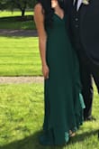 This dress is perfect that straps on the back make it so easy to tighten/loosen it to fit your body exactly. Can't say enough good things about this dress! - Sophie K.