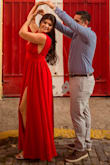 I picked this dress to take our engagement photos in Puerto Rico. The buildings in the capital are vibrant and colorful and filled with life and culture so I wanted to make sure I chose a dress to match! I ordered a medium which fit my waist perfectly!! I did have to alter in three inches shorter as it was too long. (And that's including with heels). I also had to alter the bust along the exterior corners because it was pop open just slightly if my arms were relaxed. Overall, the alterations were an easy fix and I have never had so many compliments on a dress!! The color is phenomenal and the material is great quality. I recommend this dress any day! - Jamie R.