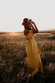 I ordered this dress for my birthday photo shoot and it was simply stunning. It fit great, is a vibrant color, the material is flowy and soft, there's a lot of movement in it and I love the shoulders. I received so many compliments! Definitely a great buy. I HIGHLY recommend! - Calandra A.
