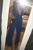 This is the second colour I own of this dress. It is absolutely stunning! I'm usually a large but beware, the waist is very tight and not forgiving. The zipper is a bit of a challenge. I decided to size up to ensure the waist was looser as I'm wearing this to a wedding and I want that extra space for food and booze! The royal blue is absolutely GORGEOUS, pictures don't do it justice. It photographs as a different kind of blue when in natural light vs inside with flash and I can't get enough. I used sticky cups and double sided tape to keep myself in place and it worked just fine. - Em K.