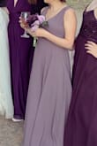 I was a bridesmaid in a friend's wedding and she wanted us to wear shades of purple. This dress looks a little grey in certain lighting, but it's purple in real life. I'm short so I had to get quite a bit of it hemmed, and I had some alterations made to the bust as well, but I have a weird body type (short and slim with big boobs) so this may not be the case for everyone. The material was super light and perfect for a wedding in the sunny New Mexico desert. I definitely will wear it again to other weddings! - Danielle D.