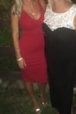 This dress was amazing! It fit so well and the material is really nice and flattering! The only thing I will agree to with the other reviews is the inside slip did slide up a lot and had to constantly fix it or it felt awkward. Got lots of compliments on this dress, the burgundy color is amazing as well! The slit on the side is so cute and gives the dress a different look - Lauren M.