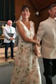 I wore this as my wedding dress and was very happy! Very comfortable, flowing and feminine. It was very long so I had to have it hemmed. I also had the sides taken in slightly. Beautiful dress. Looks more expensive than it was. The shoulder strap slid off a few times during the reception, so I would recommend some double sided garment tape! I thought it might be too low-cut, but it looked fine. Great dress! - Amy R.