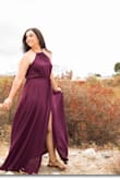 I wore this dress for our family photo session. The dress allowed for movement and had a great fit. The dress offers two points were you can tighten the fit: around the neck and around the waist. I'm smaller up top so this was perfect for me and shouldn't be an issue for women who are larger on top. Overall, I'm really happy I chose this dress and the color was perfect for the camera! - Veronica H.