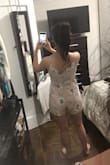 I have been trying to find a skort dress just like this for so long! The material is flowy and really flattering. More low cut than I was expecting but it isn't too revealing. Also being able to adjust the straps made it top fit perfectly so I don't need to wear a bra which is usually difficult for me. Also great for daytime or nighttime. All around love! - Kathryn S.