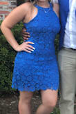 I loved this dress! I wore it to a high school homecoming dance and got so many compliments! It was super flattering to my figure and the color was beautiful. The actual color is a little more dull than the picture online. The underneath layer of the dress is stretchy while the lace layer wasn't very stretchy. Overall, I loved this dress! - Elisabeth O.
