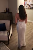 It was super long but getting hemmed. Everything else fit perfect. Wearing it to a formal event. - Trinity S.