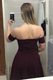 The material on this is so delicate and flowy and looks fantastic. The color was stunning and the neckline/chest fit was so sweet. The arms were a little tight but it felt secure. Cute! - Catherine E.
