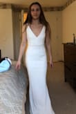 I am obsessed with this dress! I ordered a size XS in white for my wedding next year. It is too long which was to be expected, but it is also not as tight as I was hoping so will need it to be taken in slightly. I plan on dressing it up with a long veil. It is the same style of dress I was originally looking for, at a fraction of the price! Very high quality, classy, and gives an hourglass shape! - Jennifer V.
