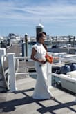 I absolutely love this dress! It is sexy without revealing too much. Simple yet elegant. I had it hemmed for 2 inches, and I wore 2-inch heels. - Barbi C.