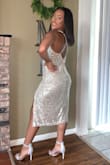 My daughter wore this dress to her homecoming. She received a lot of compliments. The material that the dress is made from allows room to move freely. It's not tight at all. - Jannie S.