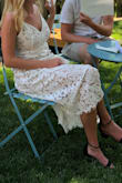 This dress got so many compliments! I wore it for both wedding showers and rehearsal dinner. People would say "you could wear that as a wedding dress!" So it is very beautiful and detailed! I loved it! Note there's not stretch to it. It also is fairly long so I didn't have to worry about accidentally flashing anyone through out the time wearing it!
Highly recommend! - Lauren E.