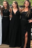 A deep V neck done in a very classy way. This dress is so flattering for curvy girls. I'm a very true hourglass and therefore can sometimes look a lot bigger than I actually am. The silhouette of this piece hides wide hips with a flowy skirt and shoes off a small waist. Just beautiful! - Patricia R.