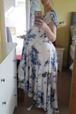 I'm devastated over the size of this dress. It's not true to size at all. I ordered an extra small but it's ginormous on me (I also ordered another dress from here which is extra small and fits me perfectly well).

Looking at other peoples' reviews, and how their dresses fit perfectly well, I think I may have somehow been sent a defective dress!? The label says it's extra small but there's no way that it is. It's frumpy, ill-fitting and I think I look like I've been swallowed by a curtain.

It's either a defective dress or there's a vast unreliability between the sizes within the company.

The customs charge to get it delivered to the UK was Â£40 so it wouldn't even be worth returning for a refund. What a huge waste of $96. Knowing that the store is unreliable, I won't be ordering from here again. 

I'm so disappointed because I love the pattern on this and I absolutely adore the other dress!! :( - Georgina H.