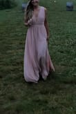 Love the pink color. The neckline was gorgeous for a smaller chest. I did have to use a lot of sticky tape so it stayed put. Give yourself time to hem the dress if you're under 5'6. - Lauren L.