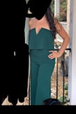 This jumpsuit was so comfortable to wear! I got sooo many compliments on the color as wear. I'm really short (5'2) so I had to wear a 2.75 inch heel AND get 4 inches altered off the bottom. - Emily T.