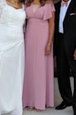 Very beautiful, love how it flows! My family loved it, I wore it for my parents 50 yr anniversary party. Unfortunately, my chest is big and I had to wear a cami to cover it up a bit. Wished it had a bit more fabric in that area. : ) - Ketty J.