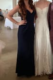 This dress was beyond comfortable! I definitely could've used an alteration on the straps. I ended up having to safety pin them to make the dress tighter. But my hair was down and covered the few visible pins. It was definitely heavier than I expected so I wouldn't suggest wearing this to a summer wedding. But it was perfect for early April in Cleveland, OH. - Jamie P.