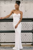 Love this dress! Sexy, sophisticated, and stylish! Perfect city wedding dress. I'm short and thin (5'1, a little under 100 lbs) so needed to have some alterations done (padding, hemming, taken in). Dress was super comfortable, could've worn it the entire night! Highly recommended for petite brides who want to show off their curves! - Victoria A.