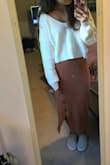 Super cute slouchy fit! Perfect length for high wasted jeans. - Erica P.