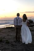 The dress is true to size, and the material is light and perfect for a beach wedding. I got many compliments on my wedding day. This dress for the price is perfect and I'm glad I bought it. - Genesis V.