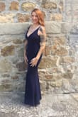 I purchased this dress to wear to a black tie wedding in Italy and it was absolutely perfect. When I chose it, I really wasn't sure the fabric would be much more than just a thicker cotton, but it has this beautiful, matte fabric over the lining which makes it look classier and more expensive.
It's form-fitting without being over-the-top for a wedding, and the small fit perfectly, even with my 34DD bust. I did need to have it altered for length (I'm only 5'4") and the straps shortened a bit because I'm short-torsoed. I just wore nipple cover petals which were fine because the fabric is structured, but I had to carefully situate them because there isn't a whole lot of coverage on top.
Overall this dress was a huge win! And I'd happily wear it to other fall/winter formal events. - Ashley C.