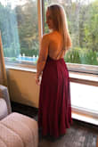 I loved this dress when I saw it. I'm a trainer so my back is wide even though I'm small. I knew this would fit with the open back but it needed 10 inches off the outside layer in order for it to fit with flats on! I wore it to a fall wedding and it wasn't too heavy to dance around in. All in all, worth the investment if you can get it hemmed! - Daphne A.