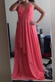 Wore this to a friend's wedding. The material is flowy and comfortable. The dress was long for my height so I had to get it hemmed, even with wearing 4in heels. I have a small chest but the dress was still flattering. There was definitely extra room in the bust for me but it wasn't so obvious to require any additional tailoring. (I recommend using dress tape for added comfort - I forgot and had to stay very upright the entire night to avoid exposing myself.) - Sarah H.