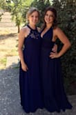 I fell in love with this dress online and bought it for a wedding I was in. I was thrilled to love it in person! I got a ton of compliments on how it looked. The only negative is it's incredibly long. I had to have at least 6 inches taken off the end. Now that the wedding is over, I think I will have it hemmed to knee length so I can wear it again. I'm thrilled with my purchase! - Ashley F.
