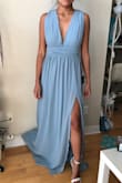 Love love love this dress! Bought this for my bridesmaids to wear for our destination wedding in Mexico! The band comes up a little wide but my girls and I decided to twist up the bands and it looks beautiful! Runs too long for my height but will get it altered, no problem! Love the slit on the dress!! - Michaela V.