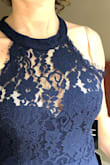 The fabric quality is awful and the stitching is irregular. One breast cup was square and one round, causing visible bulges in the fabric. It went half past my bra cups and the neckline was stretched with the weight of the polyester fabric. The return process was simple at least! - Naria D.