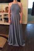 I love this dress. This was the dress I picked for my bridesmaids to wear for my wedding and the color is beautiful and it fit really well on them. The photo is of my maid of honor and she bought a small. The dress just needed to be hemmed but other than that the dress was perfect! - Rachel M.