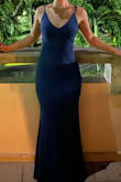 First off, this dress feels incredible as soon as you put it on! Loved the weight and feel of the fabric, and it's so flattering! I had to have it hemmed a few inches but that's pretty normal for me and my short legs. The only major issues were the straps... the adjustable straps make the whole dress look slightly cheaper, plus they were very poorly constructed. The more you adjusted the straps the more twisted they become. After a few adjustments, they were so twisted that they go stuck in a twisted mess and would not lie flat. I had to go get them turned into a single strap, but my tailor did a great job and I loved loved loved the dress when I wore it for my friends wedding! Highly recommend! - Michelle T.