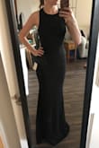 This dress is perfect in every way.  Dresses are usually big on me, but this one is very snug which is probably a sign that it runs small. There is a thick extra layer from the hips to mid-thigh, almost like built in spanx. - Nella G.